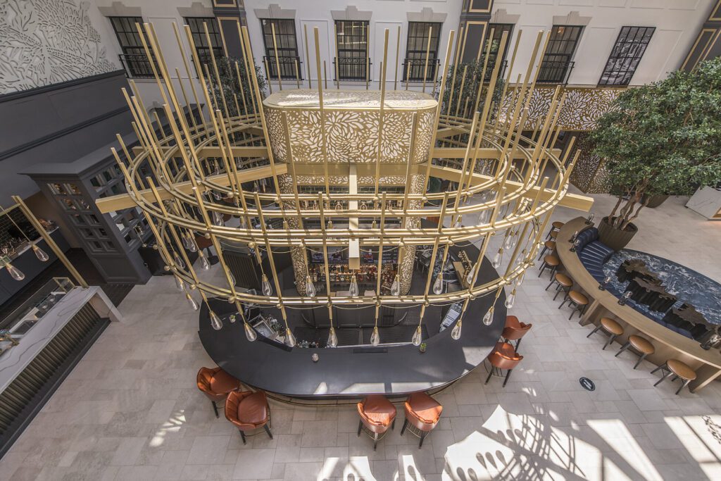 Elegant circular bar with ornate golden design.